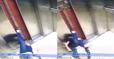 Mải nghịch điện thoại, người phụ nữ ngã sấp trong thang máy, chân mắc kẹt ở cửa và bị kéo lên vài tầng