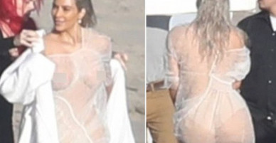 Mặc như không, Kim Kardashian lộ nhũ hoa và khoe vòng 3 khủng trên bãi biển