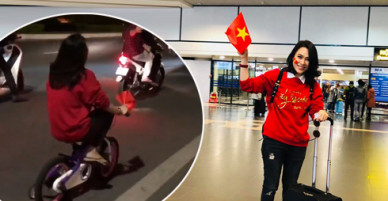 Mỹ Tâm đi dép kẹp, đạp xe 4 bánh đi bão chúc mừng U23
