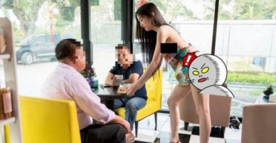 Cả gan thuê hot girl ăn mặc hở hang phục vụ khách hàng, quán cà phê Thái Lan bị cư dân mạng ném đá không thương tiếc