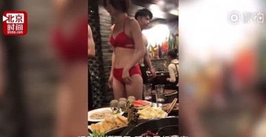 Nhà hàng lẩu bị chỉ trích vì thuê nam nữ thiếu vải phục vụ