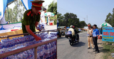 CSGT “lập chốt” phát khăn lạnh, nước suối cho người đi đường